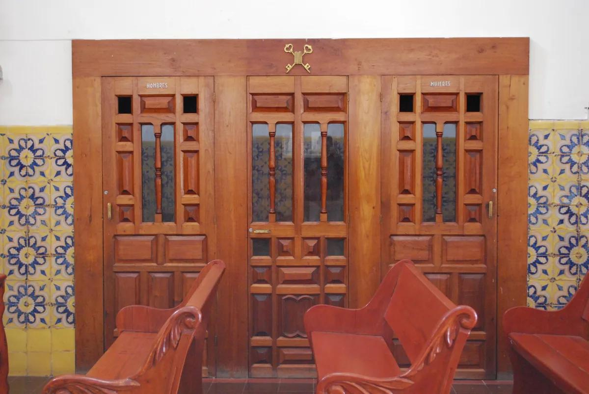 Wooden confessional booths inside Nuestra Señora de la Salud in San Miguel de Allende